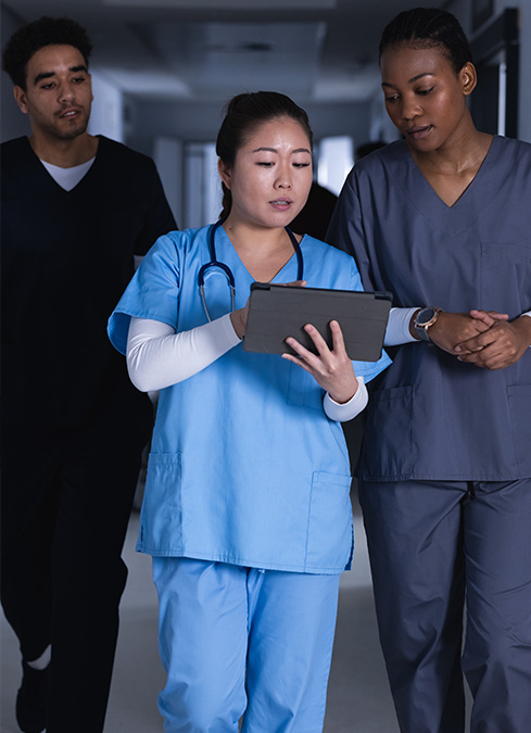 about-brundage-workforce-solutions Doctors on tablet planning schedule and resources