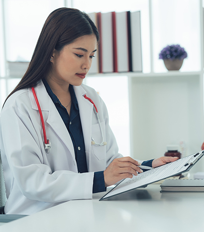 cdi Doctor with stethoscope reviewing schedule