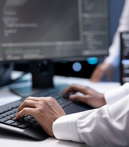 facility-coding Working on computer with medical facility coding